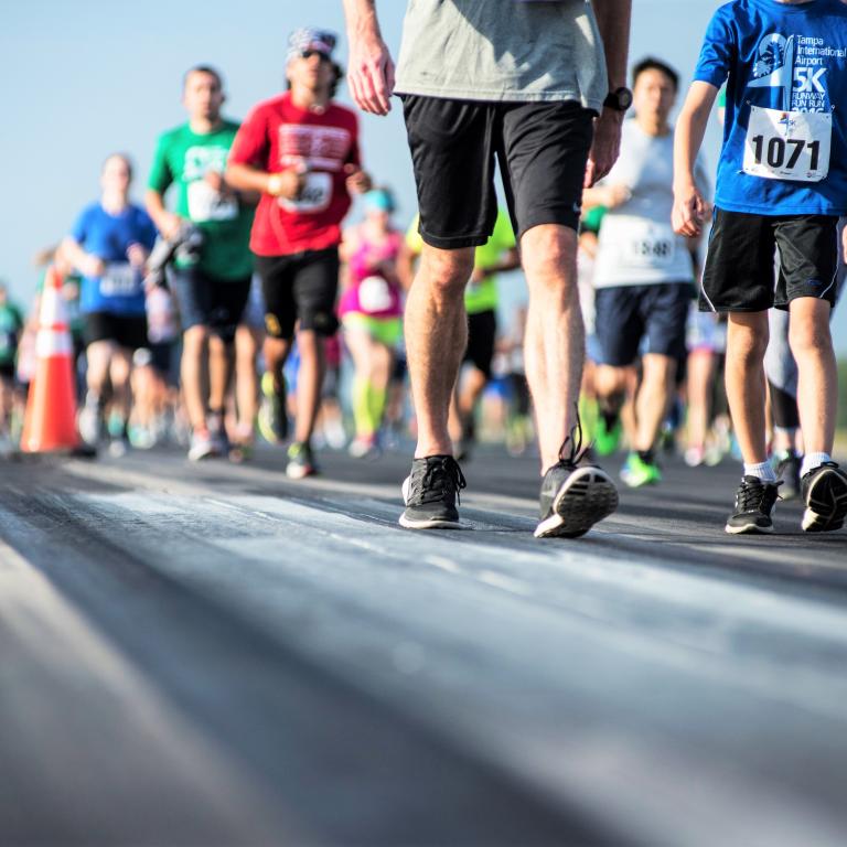 people running a 5k on TPA runway